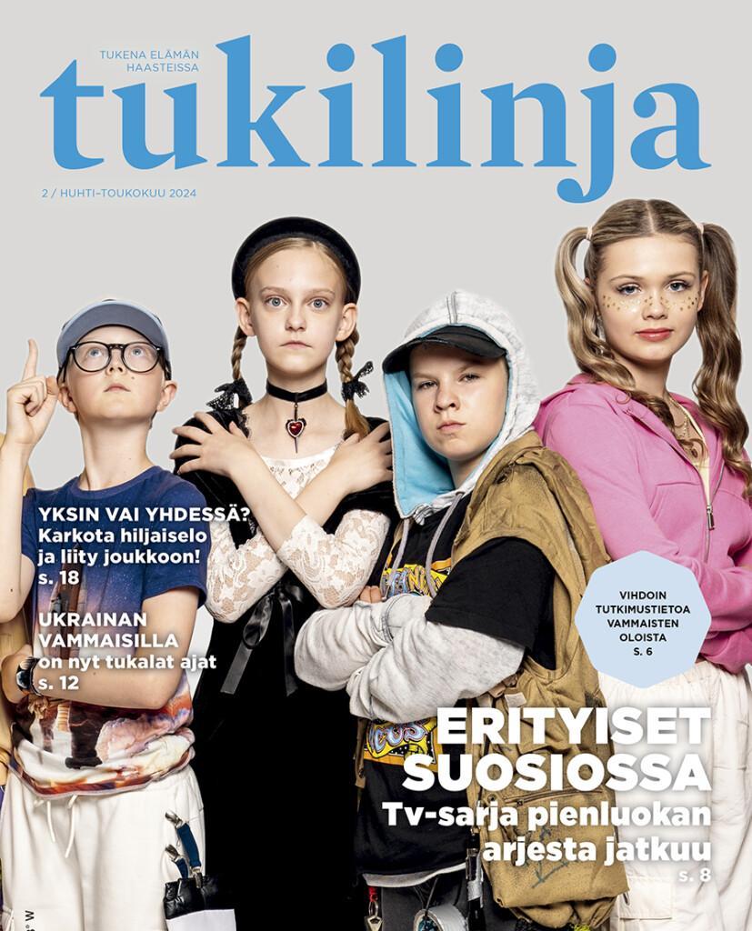 Tukilinja-lehden kansi. Kuvassa neljä lasta värikkäissä vaatteissa.