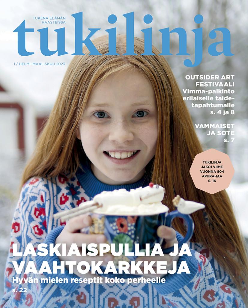 Tukilinja-lehden 1/23 kansi. Kuvassa hymyilevä tyttö iso kuppi kädessään.